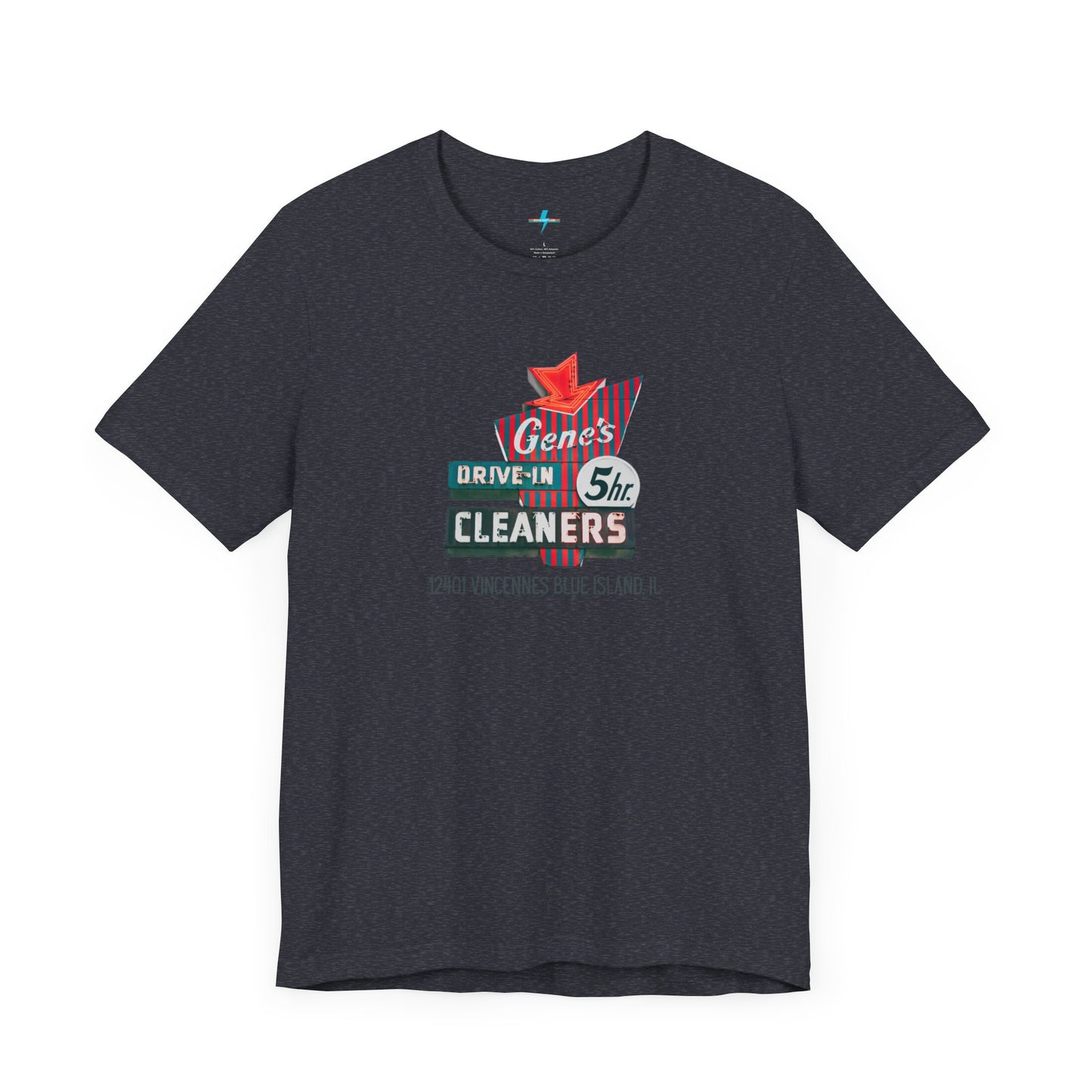 A unisex Jersey short sleeve tee from Printify featuring a light grey color with a retro-style graphic in the center. The design showcases text that reads "Gene's Drive In Cleaners, 5th," along with the address "12401 Vincennes Blue Island IL" in a blend of vintage fonts and colors, evoking the classic Chicago Fire-era vintage sign aesthetic.