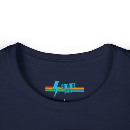 The Printify Just the Tip - Miller Beach Women's Softstyle Tee, crafted from high-quality tri-blend fabric, showcases a light blue color with a stylized wave graphic alongside the text "Just the tip. Miller Beach, Gary, IN." This tee is both casual and stylish, making it an ideal choice to express your beachside spirit.