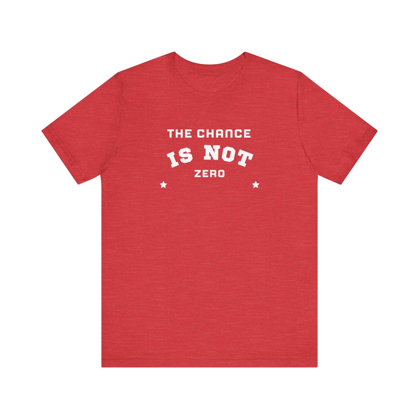 Folded light red Unisex Jersey Short Sleeve Tee from Printify, featuring bold white text that reads "THE CHANCE IS NOT ZERO" along with two star illustrations. This motivational T-shirt, made from breathable fabric, is neatly stacked with another identical shirt underneath.