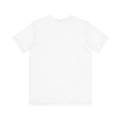 A light blue Printify "The Tinder Box 1980s" unisex jersey short sleeve tee featuring the "Tinder Box" logo in the center. The logo consists of a dark shield with the words "Tinder Box" in white text, with a small flame icon replacing the dot above the "i".