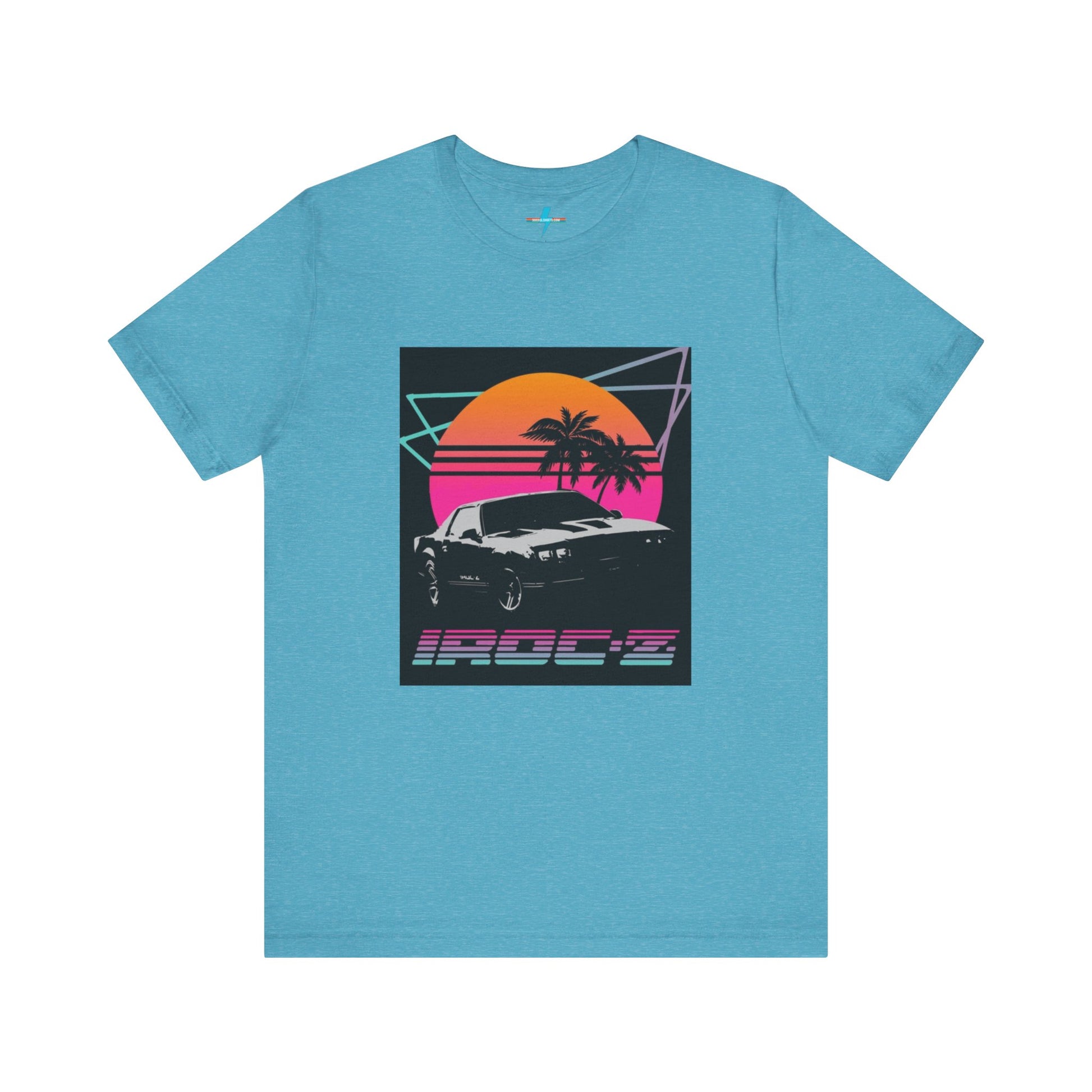 A Chevrolet Camaro iRoc Z Z28 T-Shirt 1980's by Printify, featuring a retro design with a black car, palm trees, and a sun setting in the background. The design includes geometric lines in neon colors and the text "IROC-Z" at the bottom, perfect for fans of the 1980s Chevy Camaro.