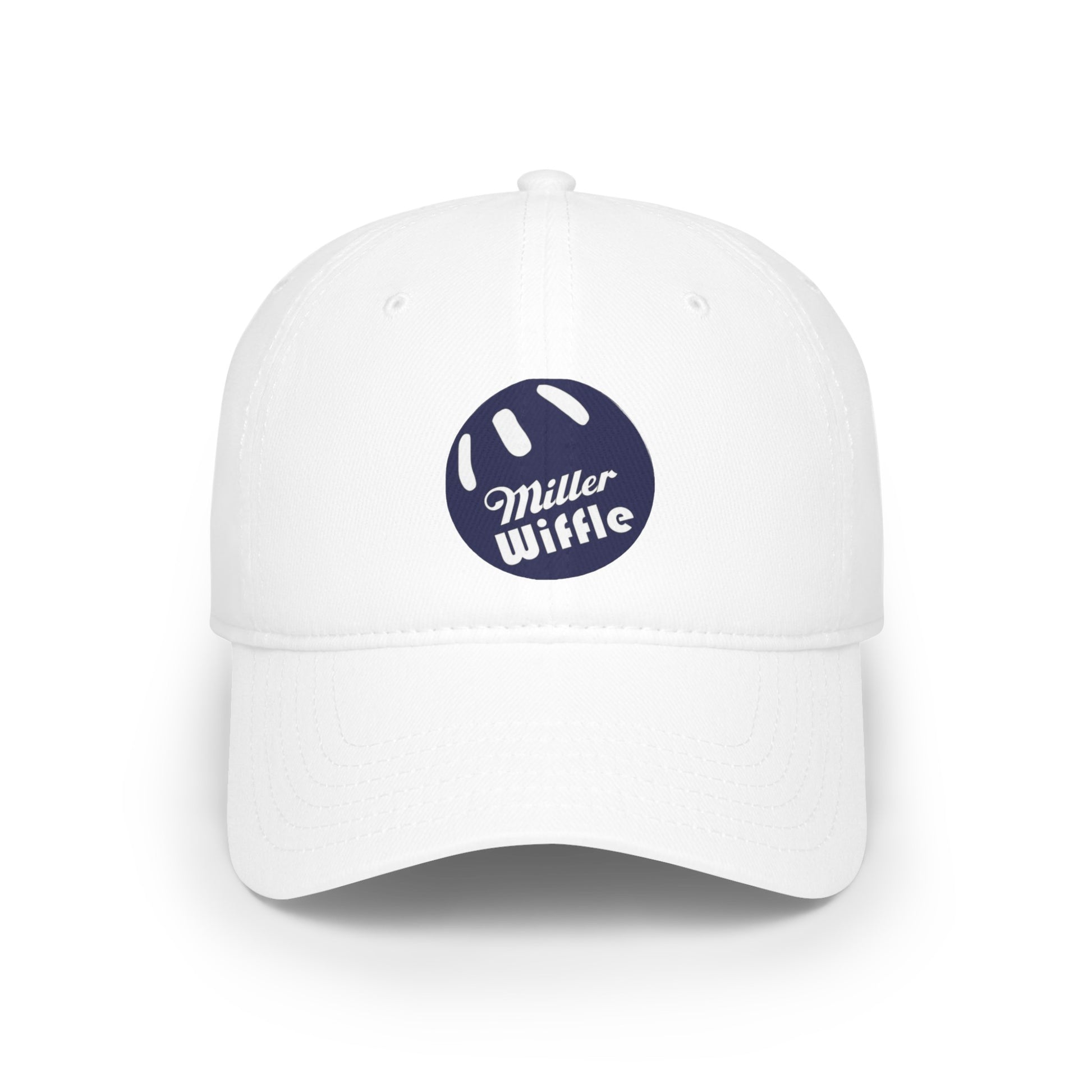 A person with long blonde hair smiles while wearing the Miller Beach Wiffel Ball - Low Profile Baseball Cap by Printify. The cap, crafted from 100% cotton, is white with a navy blue circular logo that reads "Miller Wiffle." The individual is also dressed in a light grey t-shirt, set against a plain white background.