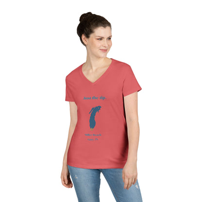 The Just the Tip - Miller Beach Ladies' V-Neck T-Shirt by Printify is a coral-colored top made from soft tri-blend fabric. It showcases a graphic of Lake Michigan accompanied by the playful text "Just the tip," along with "Miller Beach, Gary, IN" displayed below.