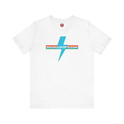 This unisex jersey short sleeve tee by Printify features a striking maroon color with a central light blue lightning bolt design. The text "SOCOOLSHIRTS.COM" is prominently displayed across the lightning bolt in white letters, set against a multicolored background that exudes retro vibes. The shirt is shown laid flat on a white backdrop.