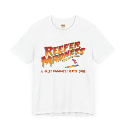 The Miller Community Theatre - Reefer Madness Cast and Crew Shirt by Printify showcases a vibrant design featuring bold, colorful text that reads "Reefer Madness The Musical" with a cartoon joint illustration. Below the main text, "A Miller Community Theatre Joint" is highlighted in red. This limited-edition green t-shirt, with its centered design, is perfect for cast and crew members.