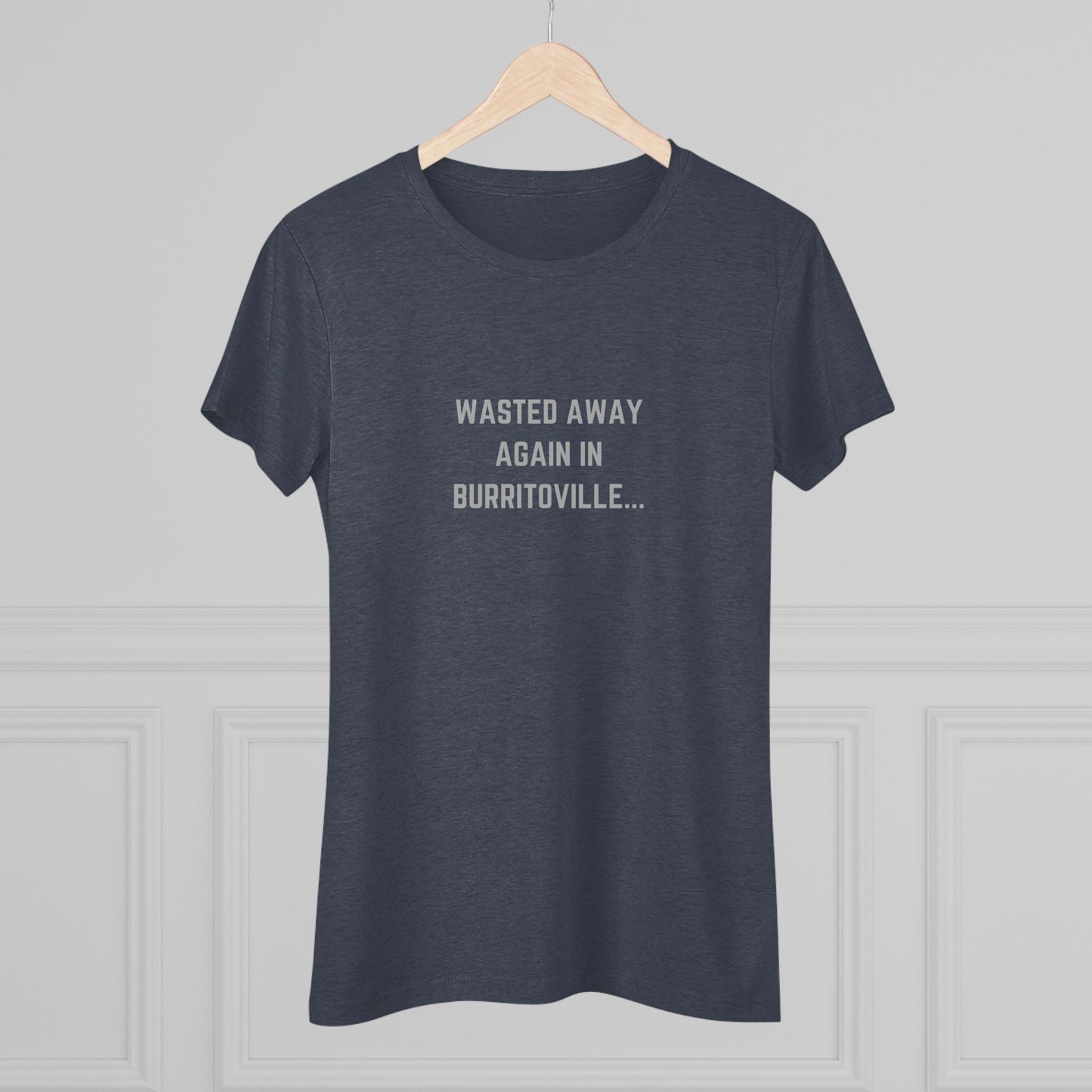 The Women's Triblend Tee from Printify, named "Wasted Away Again in Burritoville," is a dark gray heather vintage t-shirt featuring short sleeves and a crew neck. The front showcases the text "WASTED AWAY AGAIN IN BURRITOVILLE..." printed in white capital letters. This nostalgic piece from the 1980s is neatly displayed on a flat surface against a white background.