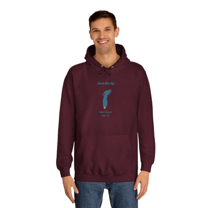 The Just the Tips - Miller Beach Unisex College Hoodie by Printify features a premium tri-blend fabric in dark green, showcasing a minimalist blue outline of a lake with the text "Just the Tip. White Bear Lake, Minn., IN" above it. With its front pocket and drawstring hood, it's an ideal choice for casual strolls at Miller Beach.