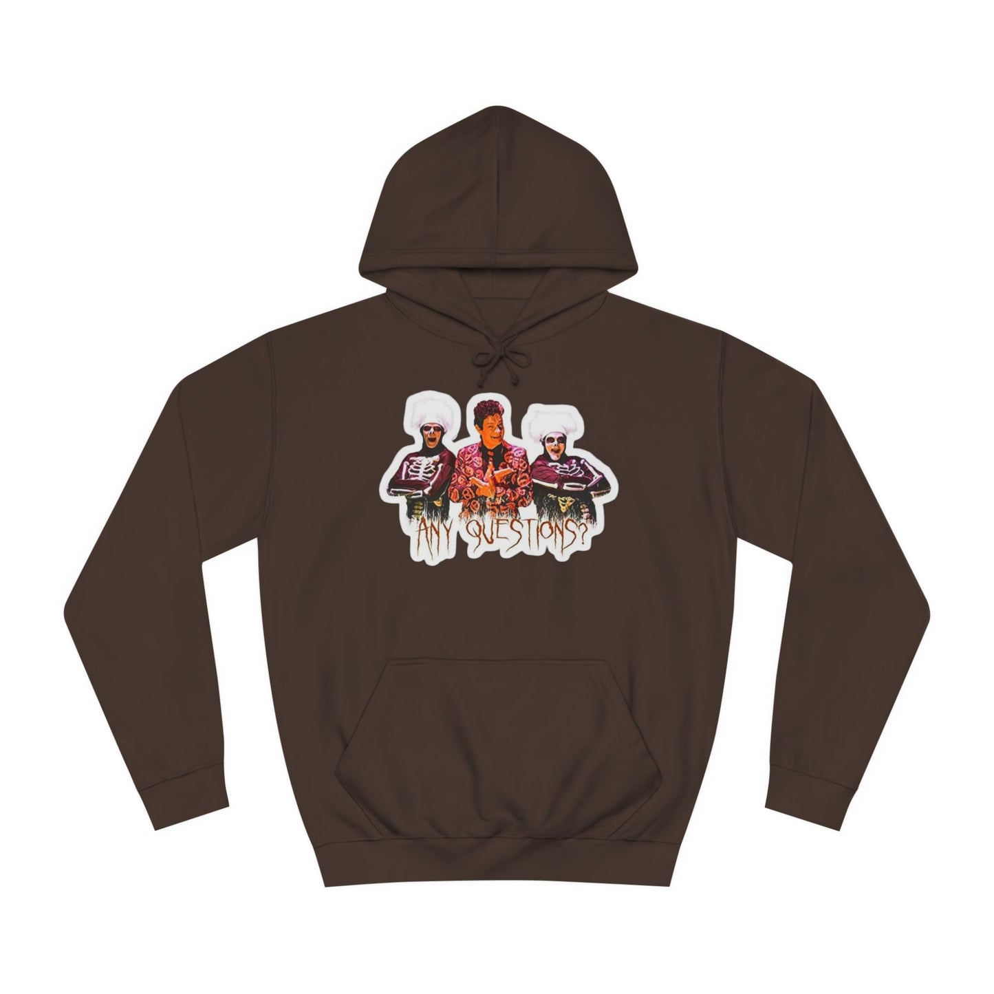 The David S Pumpkins - Any Questions? - Halloween Unisex College Hoodie by Printify is a brown sweatshirt showcasing an illustration of three people. The central figure has red hair, sports a colorful ensemble, and emanates a Halloween vibe, with two flanking figures who have white hair and wear dark attire. Beneath the trio is the phrase "Any Questions?