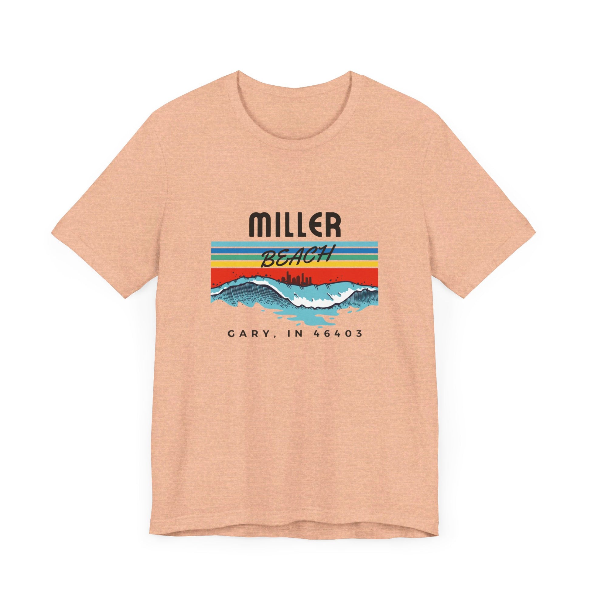 The Miller Beach 46403 Surf Style - Unisex Jersey Short Sleeve Tee by Printify features a retro surf-inspired design on a yellow background. The shirt displays "MILLER BEACH" above waves with a skyline illustration, while "Cary, IN 46403" is printed below the waves. The vibrant design also includes colorful stripes in shades of blue, red, and orange.