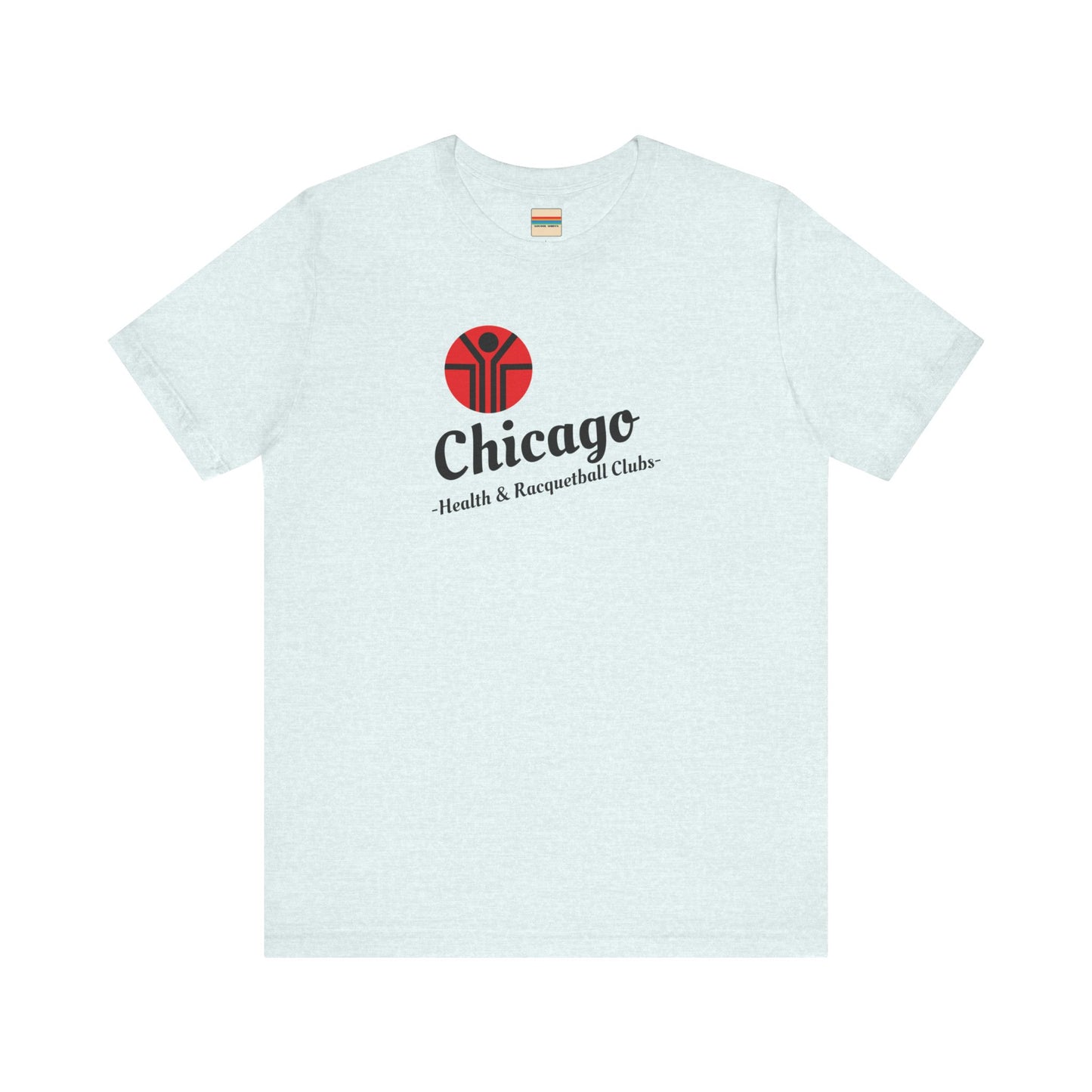 Two gray T-shirts are neatly folded on top of each other, with the top shirt showcasing the text "Chicago Health & Racquetball Clubs" in black below a red logo featuring a person with raised arms inside a circular design. This retro-inspired tee, named "Chicago Health Clubs 1980s Retro - Unisex Jersey Short Sleeve Tee" by Printify, is perfect for any fan of Chicago Health Clubs.