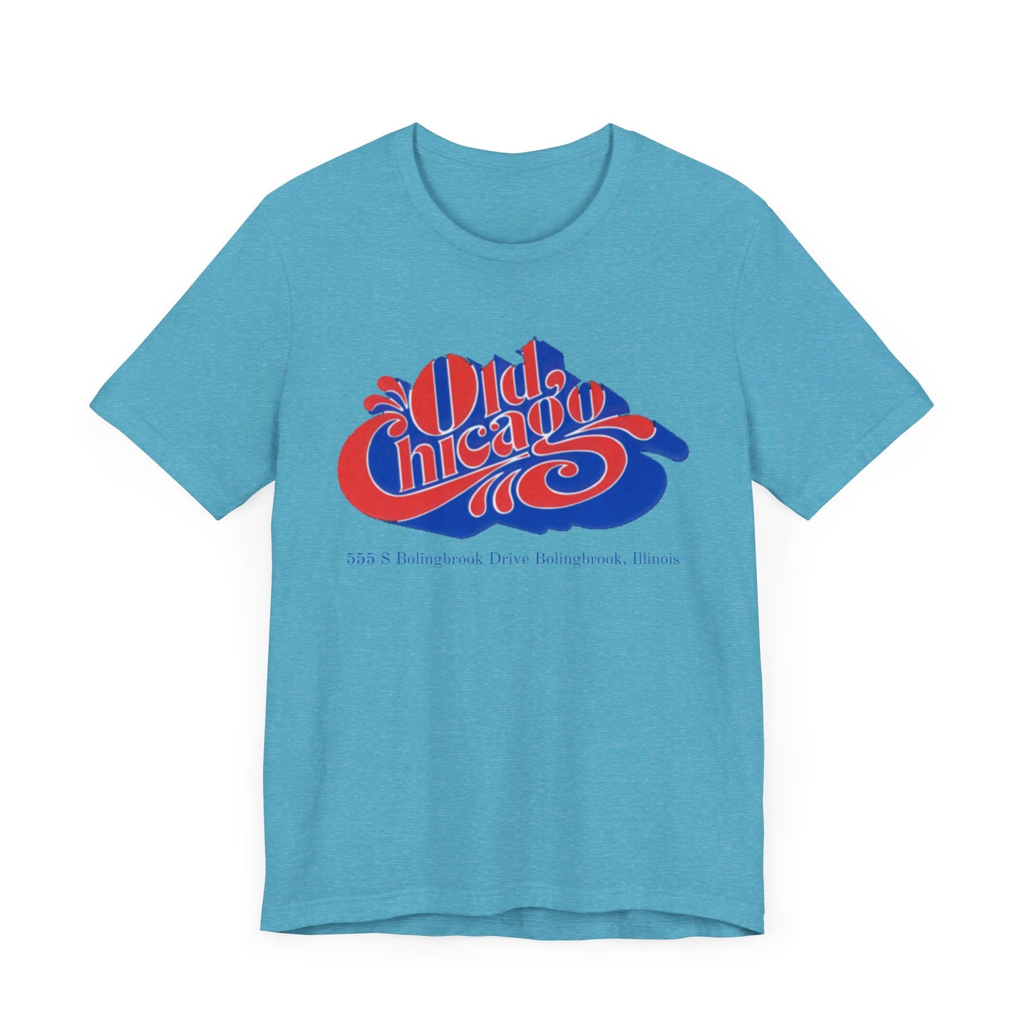 The "Old Chicago Mall Bolingbrook 1980s Retro - Unisex Jersey Short Sleeve Tee" from Printify is a gray T-shirt showcasing a vintage design with the text "Old Chicago" in blue and red. Beneath the main text, the address "355 S. Bolingbrook Drive, Bolingbrook, Illinois" appears in smaller font, evoking 80s nostalgia of the Old Chicago Mall. The shirt is displayed against a white background.