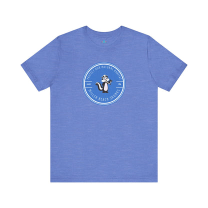 The Printify Miller Beach Skunks - Unisex Jersey Short Sleeve Tee is a gray T-shirt that features a circular blue logo at the center. Inside the logo, there is an illustration of a skunk with the text "Protect Our Habitat" and "Miller Beach Skunks" around the border, promoting environmental consciousness. The upper left part of the logo reads "Gary, IN.