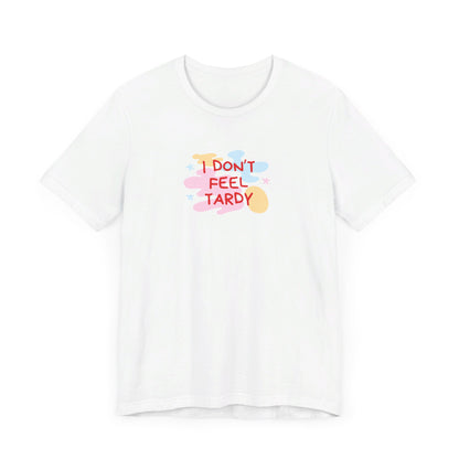 The "I Don't Feel Tardy - 1980s Retro - Unisex Jersey Short Sleeve Tee" from Printify is a light pink jersey shirt that features the bold, colorful text "I DON'T FEEL TARDY" prominently at its center. This design exudes retro vibes with small star shapes and abstract splashes of blue, yellow, and pink, laid flat against a plain background to channel pure Van Halen T-shirt energy.