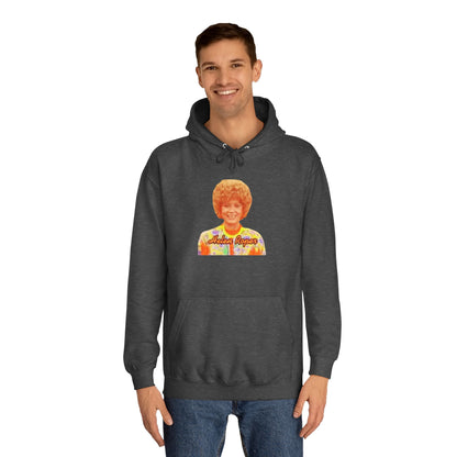 This Helen Roper - Three's Company unisex hoodie by Printify features a lively graphic of a woman with curly hair in a vibrant, patterned outfit. The elegantly scripted text "Mother Rogers" beneath her adds a vintage fashion flair to any wardrobe.