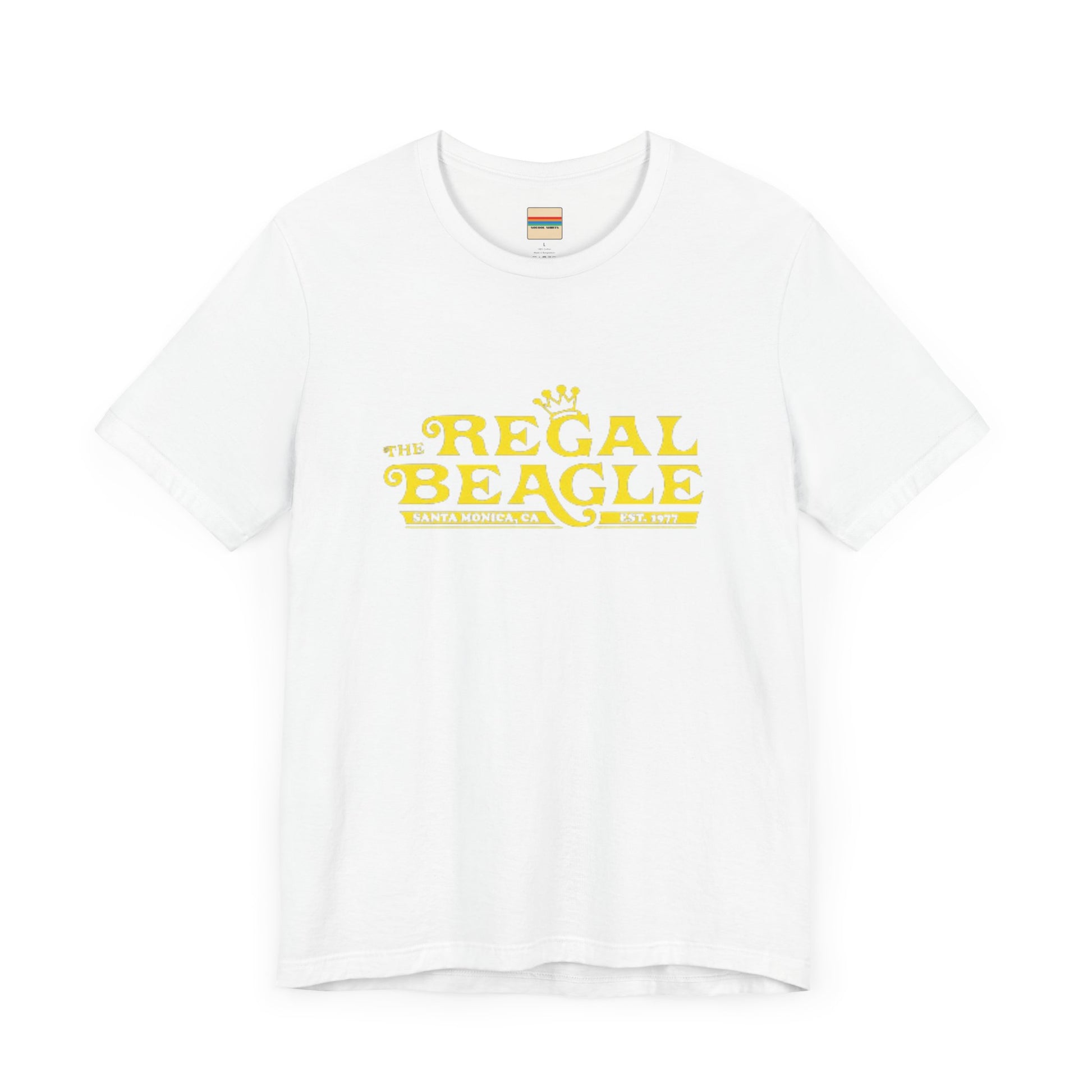 The Printify Regal Beagle - Three's Company Unisex Jersey Short Sleeve Tee, in black, showcases "The Regal Beagle, Santa Monica, CA, Est. 1977" text in a yellow vintage-style font. Crafted from 100% Airlume combed cotton for superior comfort.