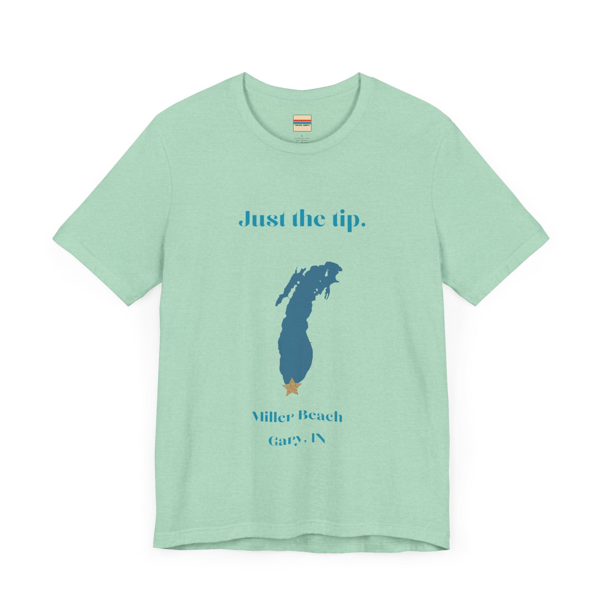 The Just the Tip - Miller Beach Unisex Jersey Short Sleeve Tee by Printify in yellow showcases text and a graphic design. The top displays "Just the tip" above a blue silhouette reminiscent of Indiana. At the bottom, it reads "Miller Beach" and "Gary, IN." Made from soft Airlume combed cotton, this tee offers both comfort and style.