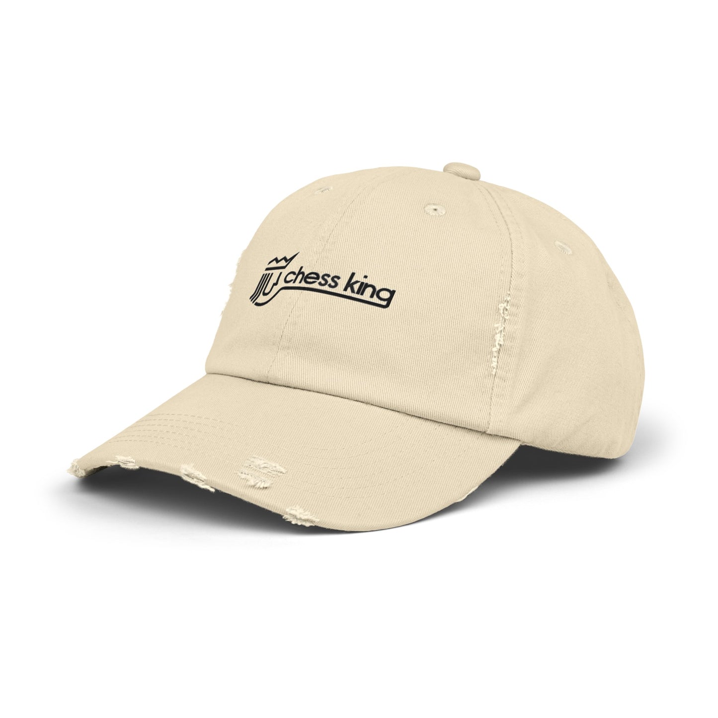 The 1980s Chess King Clothing Store Logo - Unisex Distressed Cap by Printify is a beige baseball cap made from 100% cotton twill. It features intentional distress details and a logo with a crown and rook piece, along with the text "chess king" embroidered on the front, making it a stylish choice for custom caps enthusiasts.