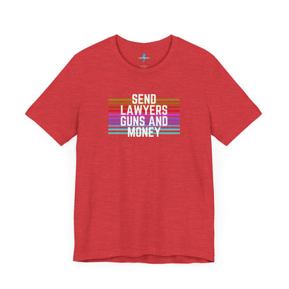 A folded Send Lawyers, Guns, and Money - Retro - Unisex Jersey Short Sleeve Tee by Printify, featuring colorful horizontal stripes and bold white text reading "SEND LAWYERS GUNS AND MONEY" in the center, as a classy tribute to Warren Zevon.