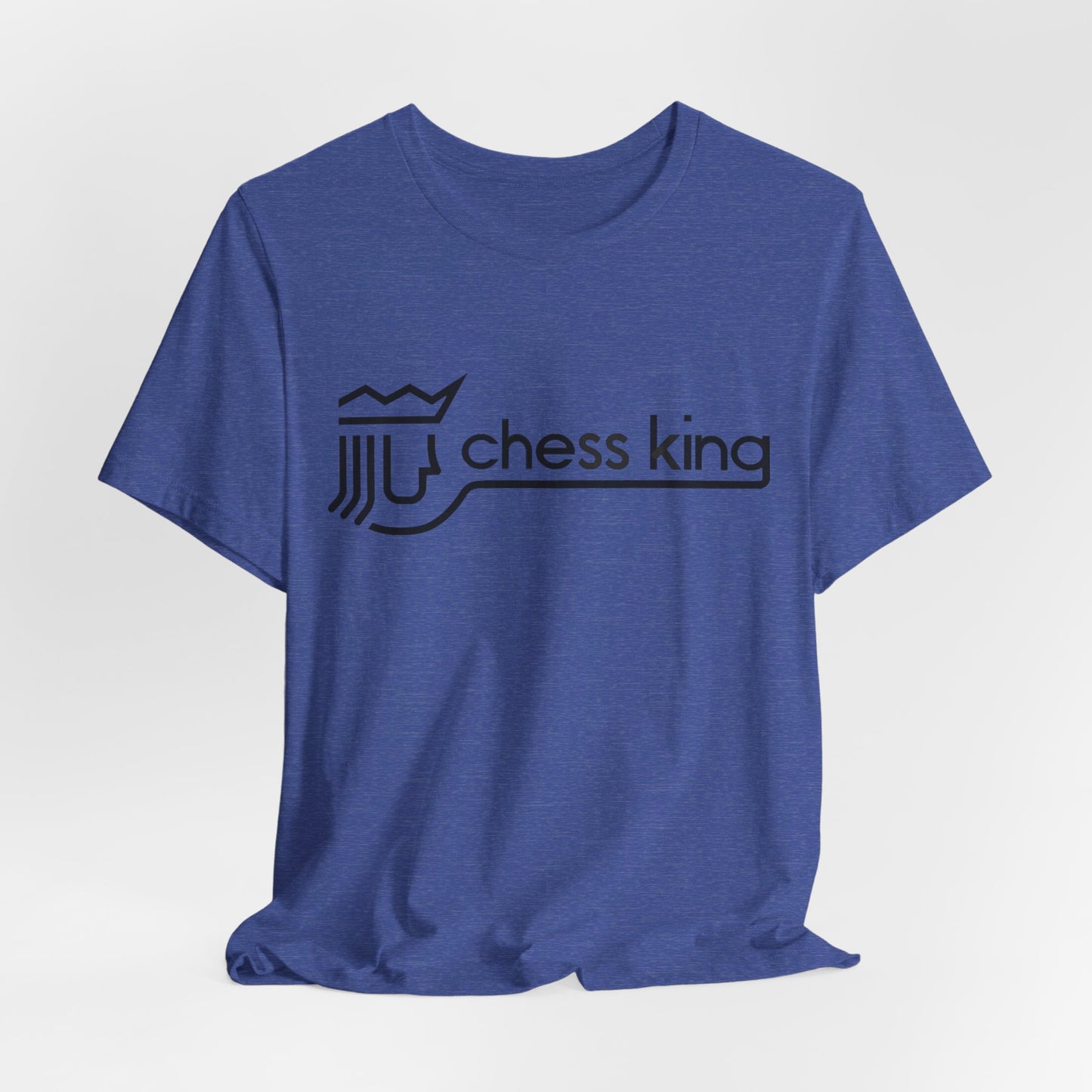 A unisex jersey short sleeve tee from Printify, featuring the Chess King 1980's Clothing Store Logo with a black, stylized king chess piece and the words "Chess King" on a blue background, reminiscent of retro 80s fashion.