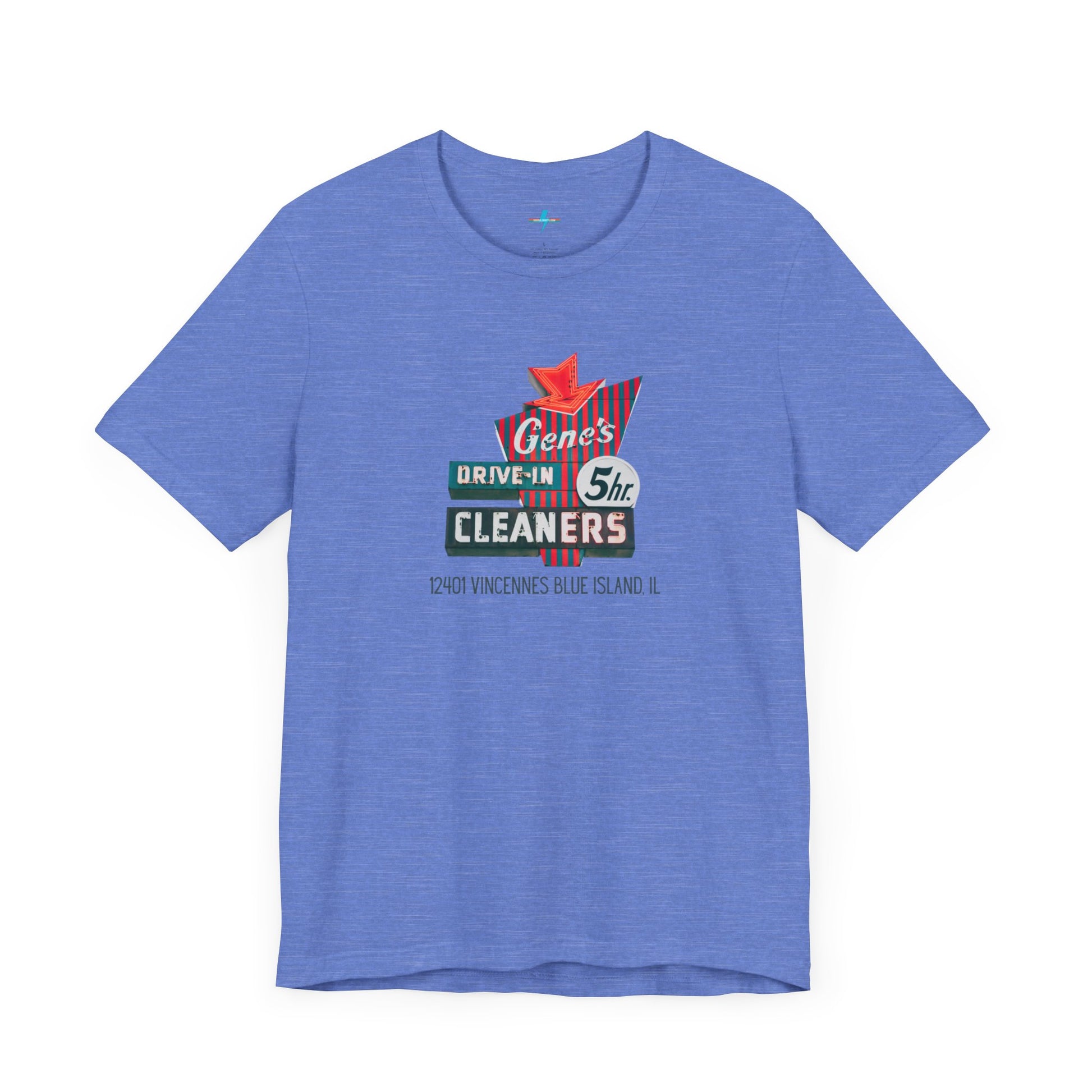 A unisex Jersey short sleeve tee from Printify featuring a light grey color with a retro-style graphic in the center. The design showcases text that reads "Gene's Drive In Cleaners, 5th," along with the address "12401 Vincennes Blue Island IL" in a blend of vintage fonts and colors, evoking the classic Chicago Fire-era vintage sign aesthetic.