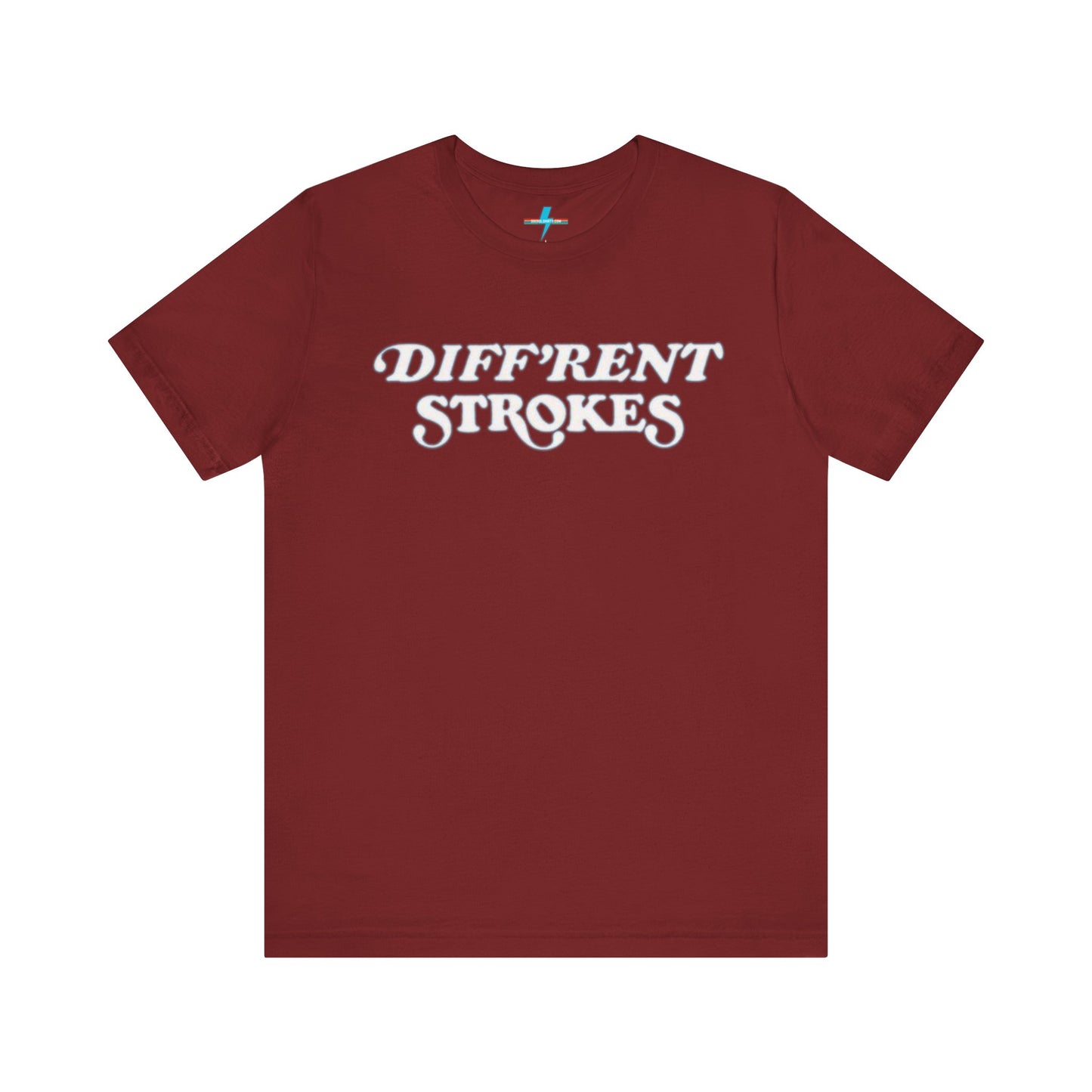 A burnt orange "Diff’Rent Strokes - Retro 1980s" unisex jersey short sleeve tee by Printify, featuring the phrase "DIFF'RENT STROKES" in bold, white cursive letters across the chest. The plain white backdrop perfectly showcases this nostalgic TV apparel.