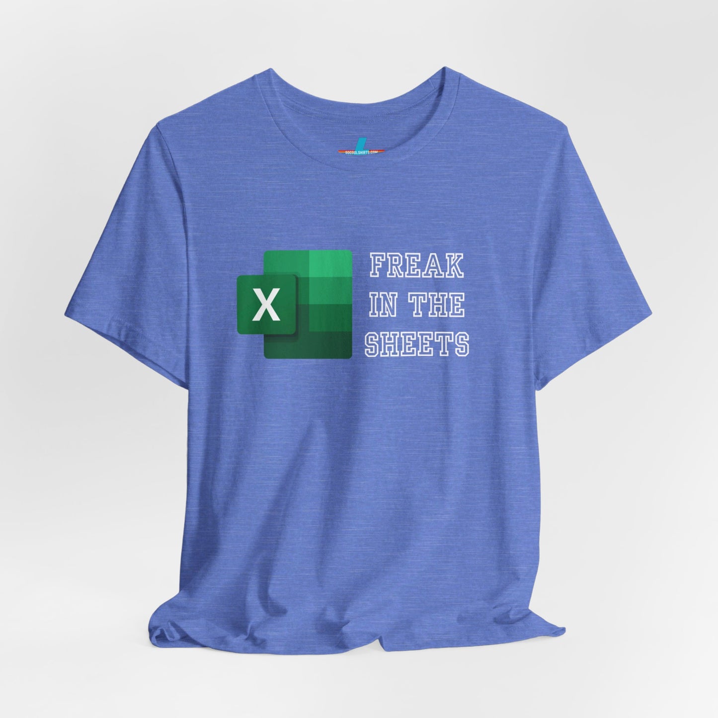 A green Freak in the Sheets - Excel - Unisex Jersey Short Sleeve Tee from Printify, featuring the Microsoft Excel logo on the left. The text next to the logo reads, "FREAK IN THE SHEETS" in white, bold, all-caps letters, making it perfect for spreadsheet enthusiasts. The shirt is laid flat against a plain white background.