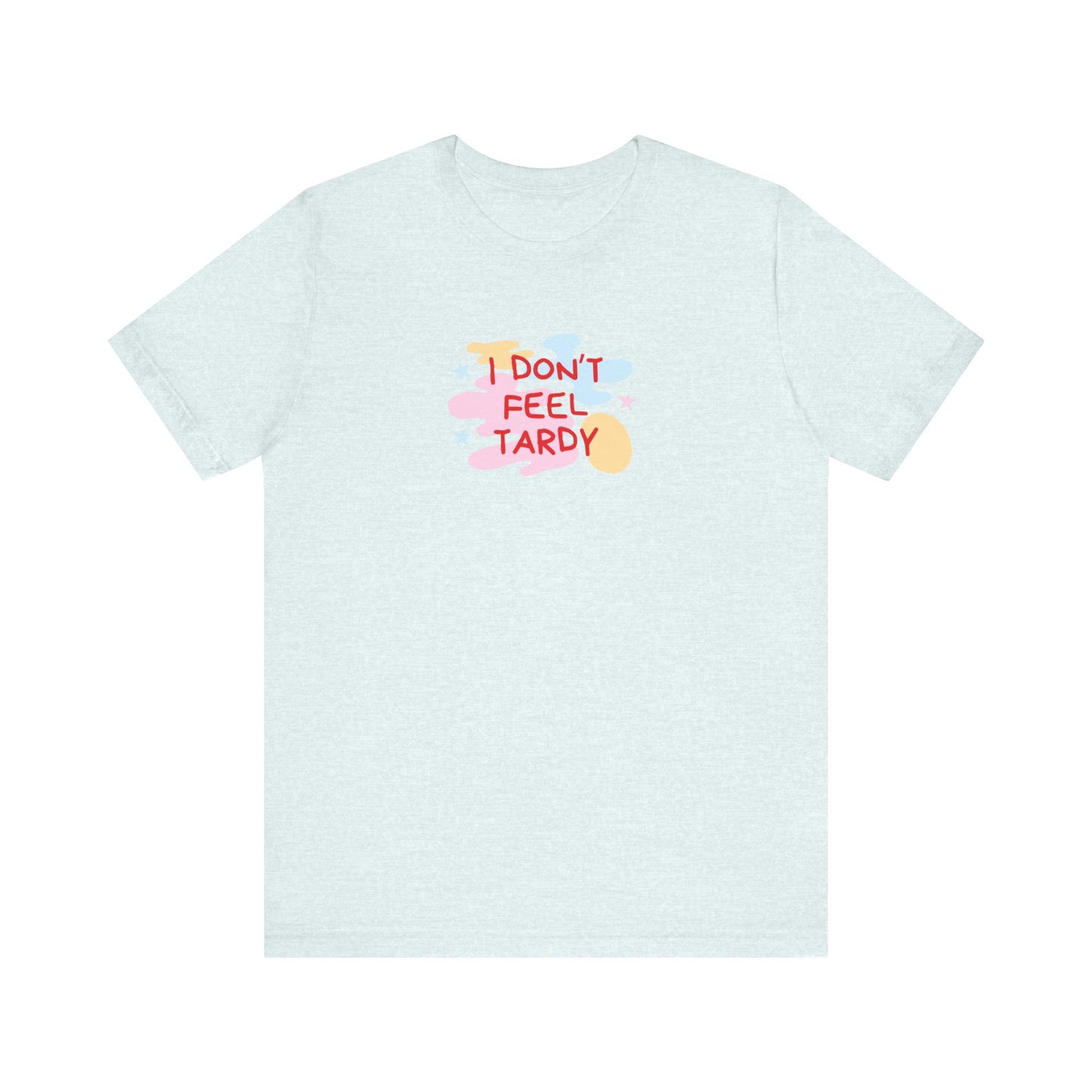 The "I Don't Feel Tardy - 1980s Retro - Unisex Jersey Short Sleeve Tee" from Printify is a light pink jersey shirt that features the bold, colorful text "I DON'T FEEL TARDY" prominently at its center. This design exudes retro vibes with small star shapes and abstract splashes of blue, yellow, and pink, laid flat against a plain background to channel pure Van Halen T-shirt energy.