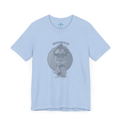 Introducing the Hegewisch Records - Retro 1980s Unisex Jersey Short Sleeve Tee by Printify: This light blue T-shirt features a central printed design with a monochromatic illustration of a stylized cartoon character with large eyes, holding or playing a vinyl record. Above the character, the text reads "Hegewisch Records" – an ideal choice for music lovers.