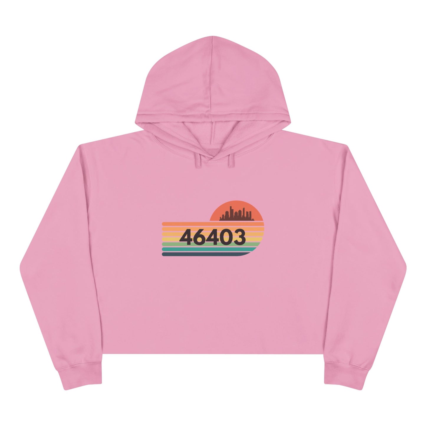 The Miller Beach 46403 Women's Crop Hoodie by Printify features a nostalgic design with a city skyline silhouette and the iconic "46403" zip code, set against a striped sunset backdrop in vibrant orange, green, and yellow hues that capture the essence of Miller Beach.