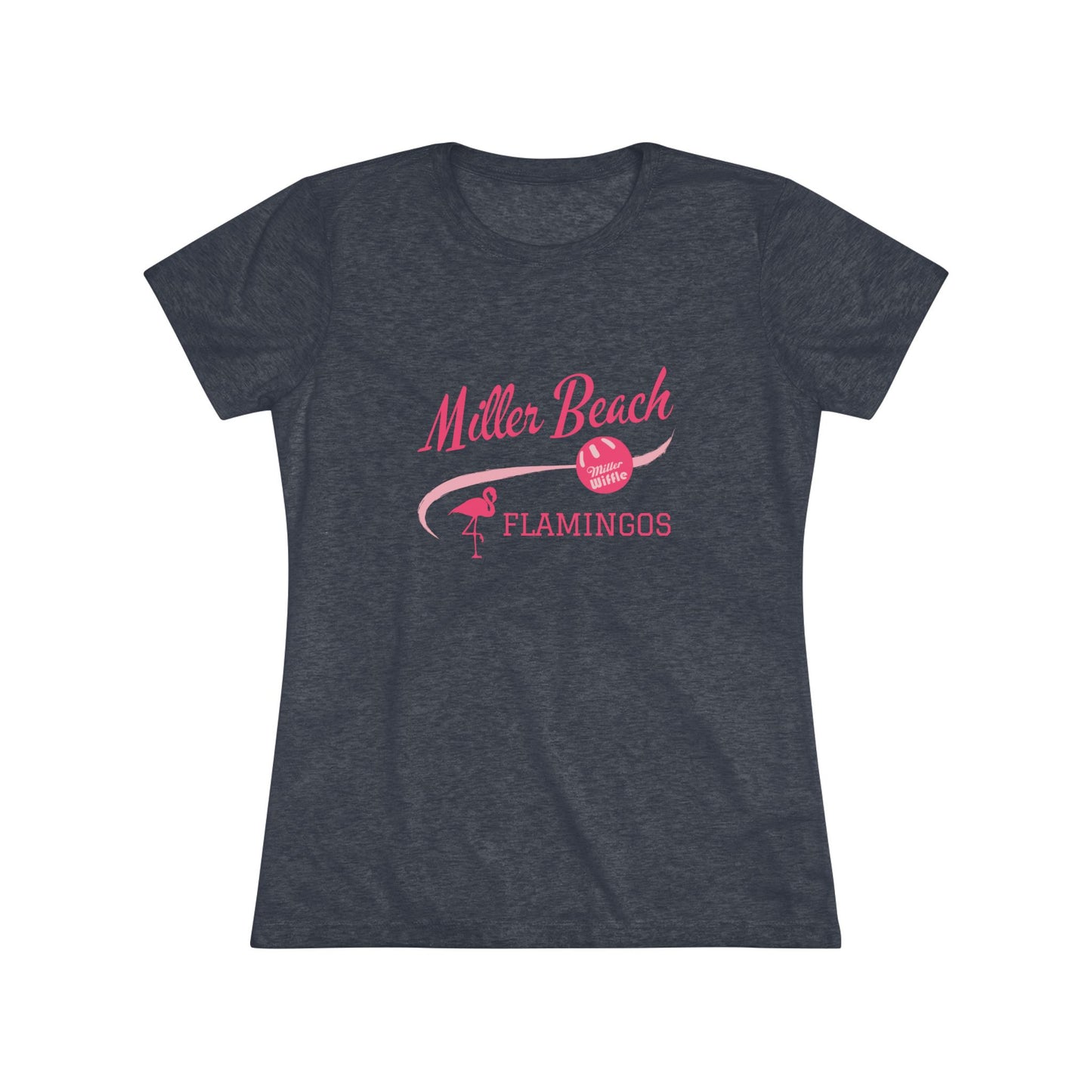 The Printify Miller Beach Wiffel Ball - Flamingos Women's Triblend Tee is a dark gray shirt featuring the text "Miller Beach Flamingos" in pink. The design showcases a flamingo standing on one foot beside a beach volleyball, exuding a fun and relaxed beach atmosphere. This limited edition tee is ideal for celebrating the World Championship of Wiff Ball.