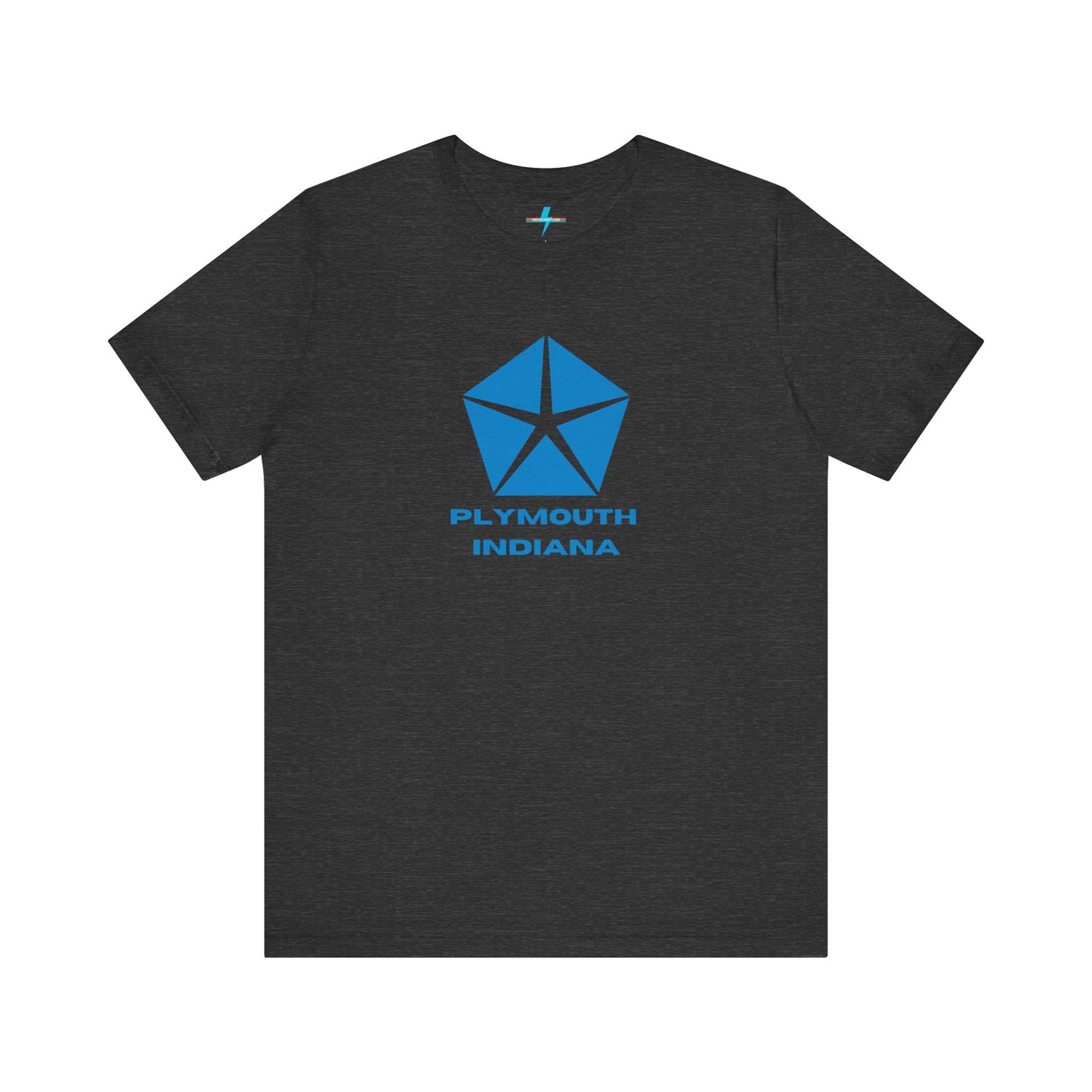 A black Printify Plymouth, Indiana Chrysler Logo T-shirt is displayed against a plain white background. The shirt features a blue, five-point star emblem reminiscent of a vintage autos design above the text "PLYMOUTH INDIANA" in blue, centered across the front. The shirt is laid out flat with the sleeves slightly bent.