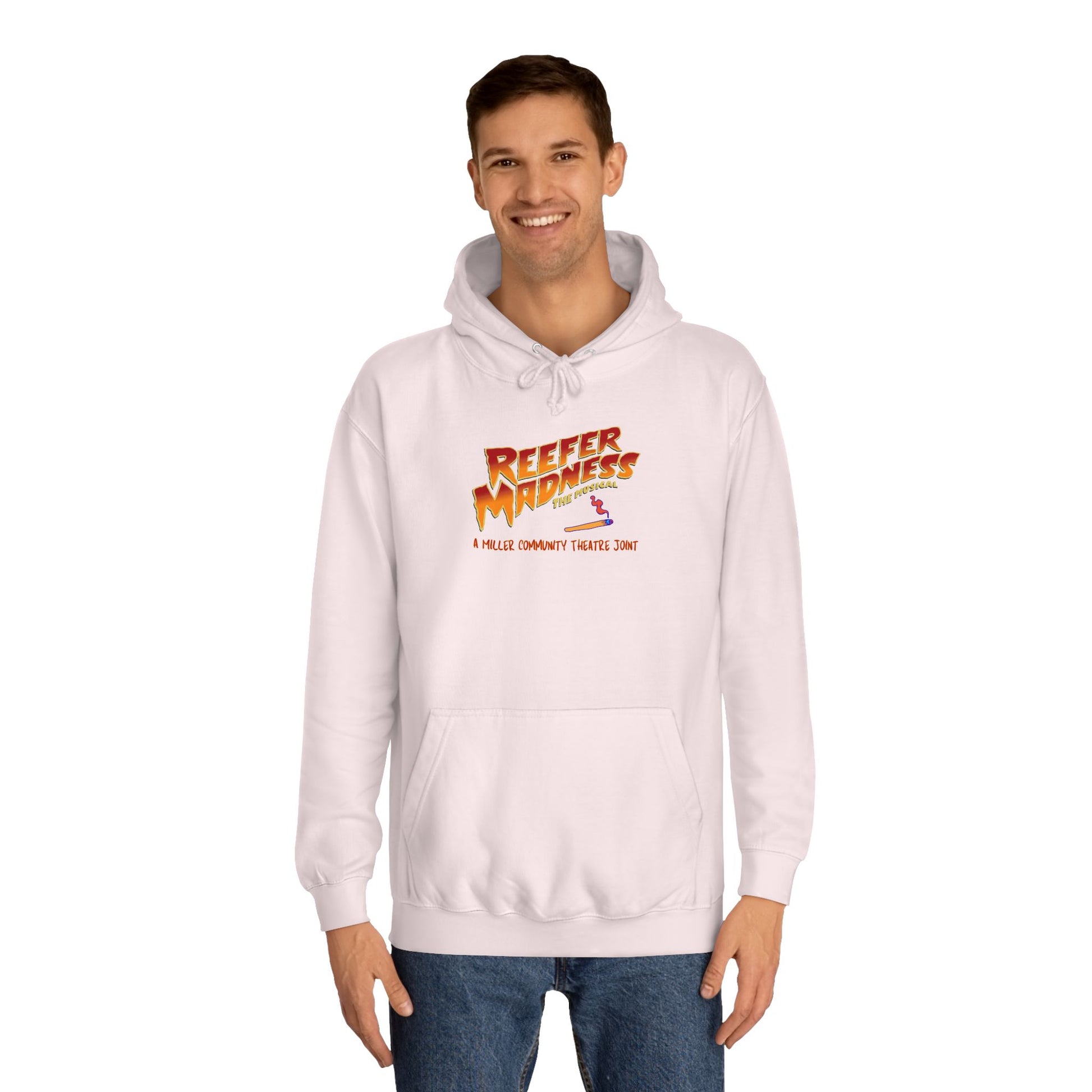 Introducing the "Reefer Madness - A Miller Community Theatre Joint" hoodie by Printify—a green hoodie with "Reefer Madness The Musical" displayed in bold, colorful font. Beneath it, the phrase "A very scary trip!" is featured. This hoodie is ideal for fans of the Miller Community Theatre production and comes with a front pocket and a drawstring hood.