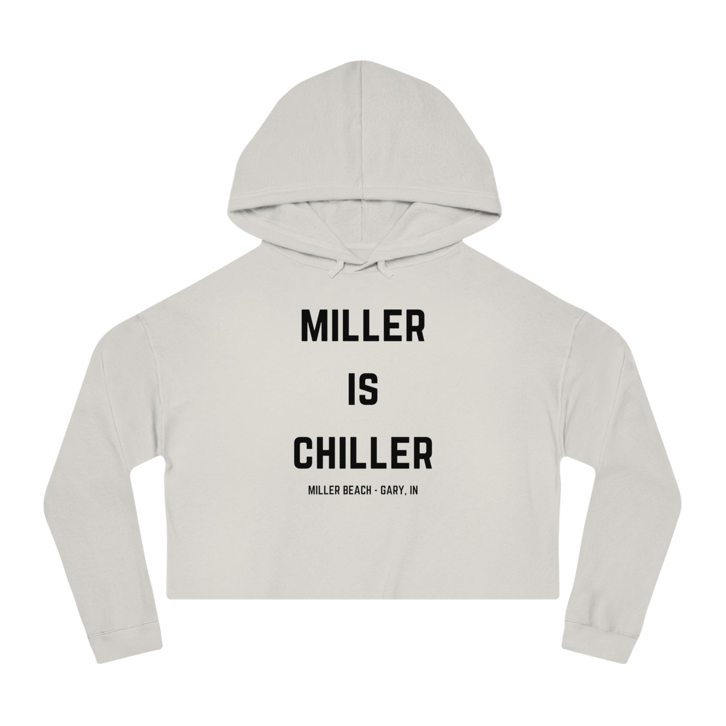 A white Women's Cropped Hooded Sweatshirt by Printify, featuring the phrase "MILLER IS CHILLER" printed in bold black letters on the front. Below the phrase, it says "MILLER BEACH • GARY, IN" in smaller black text. The SoCool Shirts hoodie includes a drawstring hood and long sleeves.