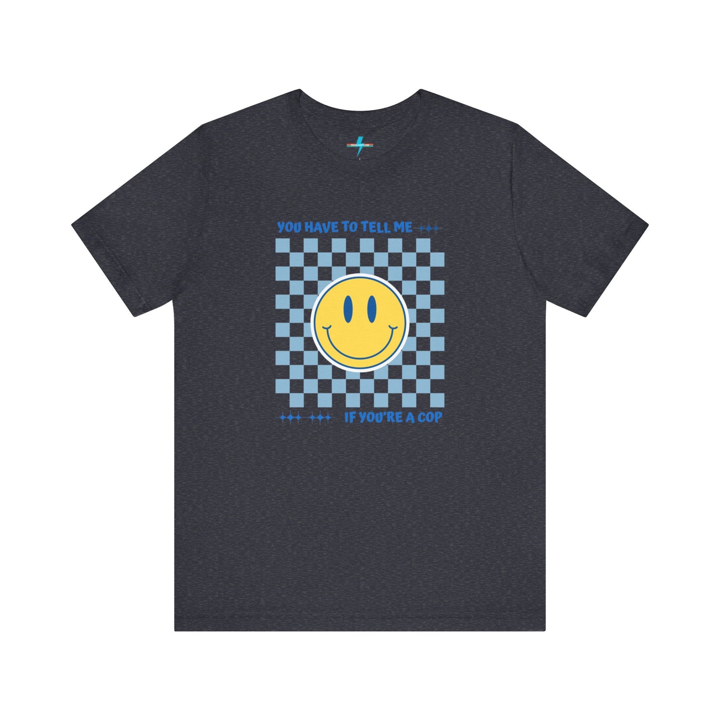 A light yellow unisex jersey short sleeve tee from Printify featuring a blue and yellow checkerboard pattern with a large yellow smiley face in the center. The shirt displays blue text above and below the pattern that reads, "You have to tell me if you're a cop." It's made from 100% Airlume combed and ring-spun cotton.