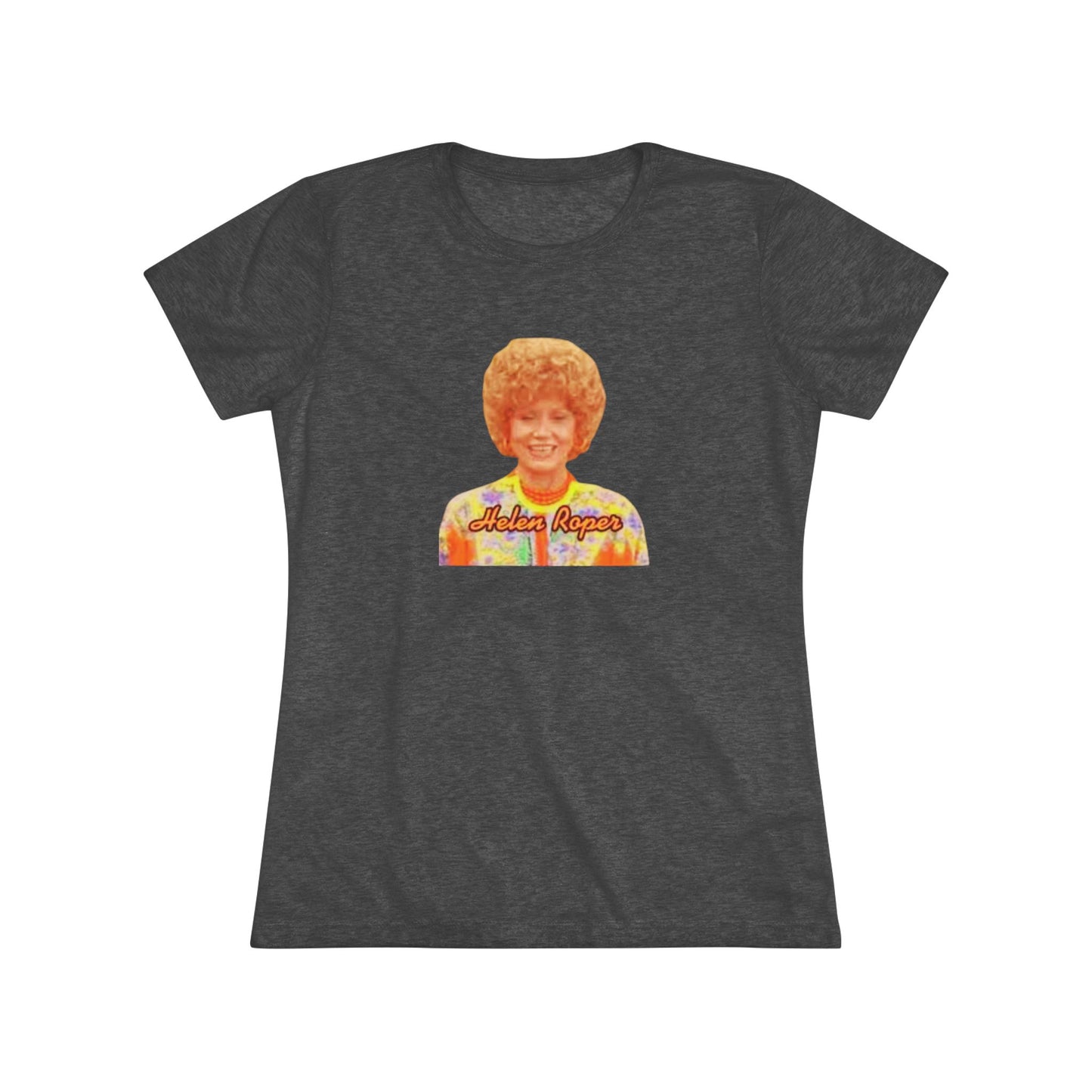 A Women's Triblend Tee by Printify, titled "Helen Roper - Three's Company," features a red design with an illustration of a smiling person with curly hair and colorful clothing. Below the illustration, the text "Helen Roper" is written in a bold, retro font, capturing the essence of vintage TV humor.