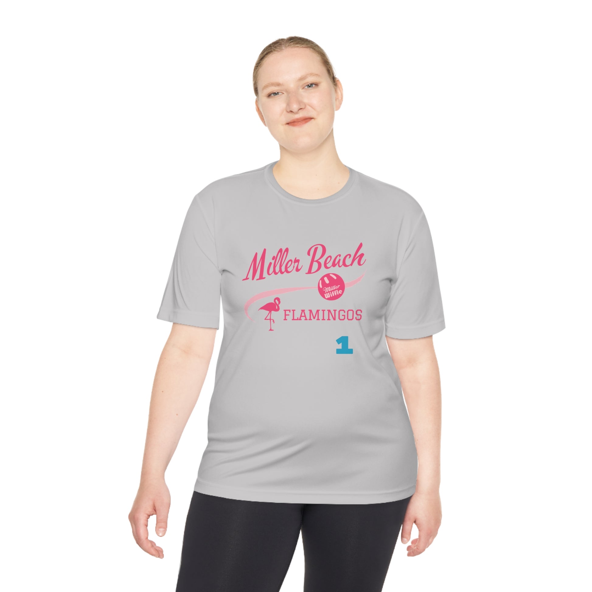 Introducing the "Miller Beach Flamingos - Jackson 01" Unisex Moisture Wicking Tee by Printify. This beige T-shirt showcases "Miller Beach" in a pink cursive font accompanied by a small pink flamingo illustration. Below, "FLAMINGOS" is displayed in bold pink capital letters, with a blue "01" on the bottom right corner. As part of the Sport-Tek PosiCharge Competitor collection, this lightweight shirt provides superior moisture-wicking performance.