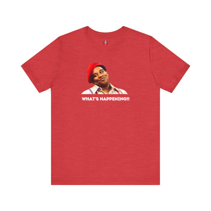 The Rerun - Fred Berry - What's Happening T-Shirt from Printify, a Retro 1980s Unisex Jersey Short Sleeve Tee, features an illustration of a person in a red cap and suspenders with the caption "WHAT'S HAPPENING!!" in white text below. This unique shirt is sure to make a statement!